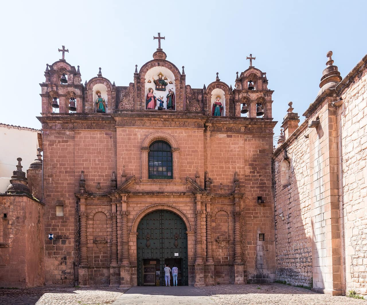 The cathedral on the Plaza de Armas in Cusco, Peru, with mountains behind