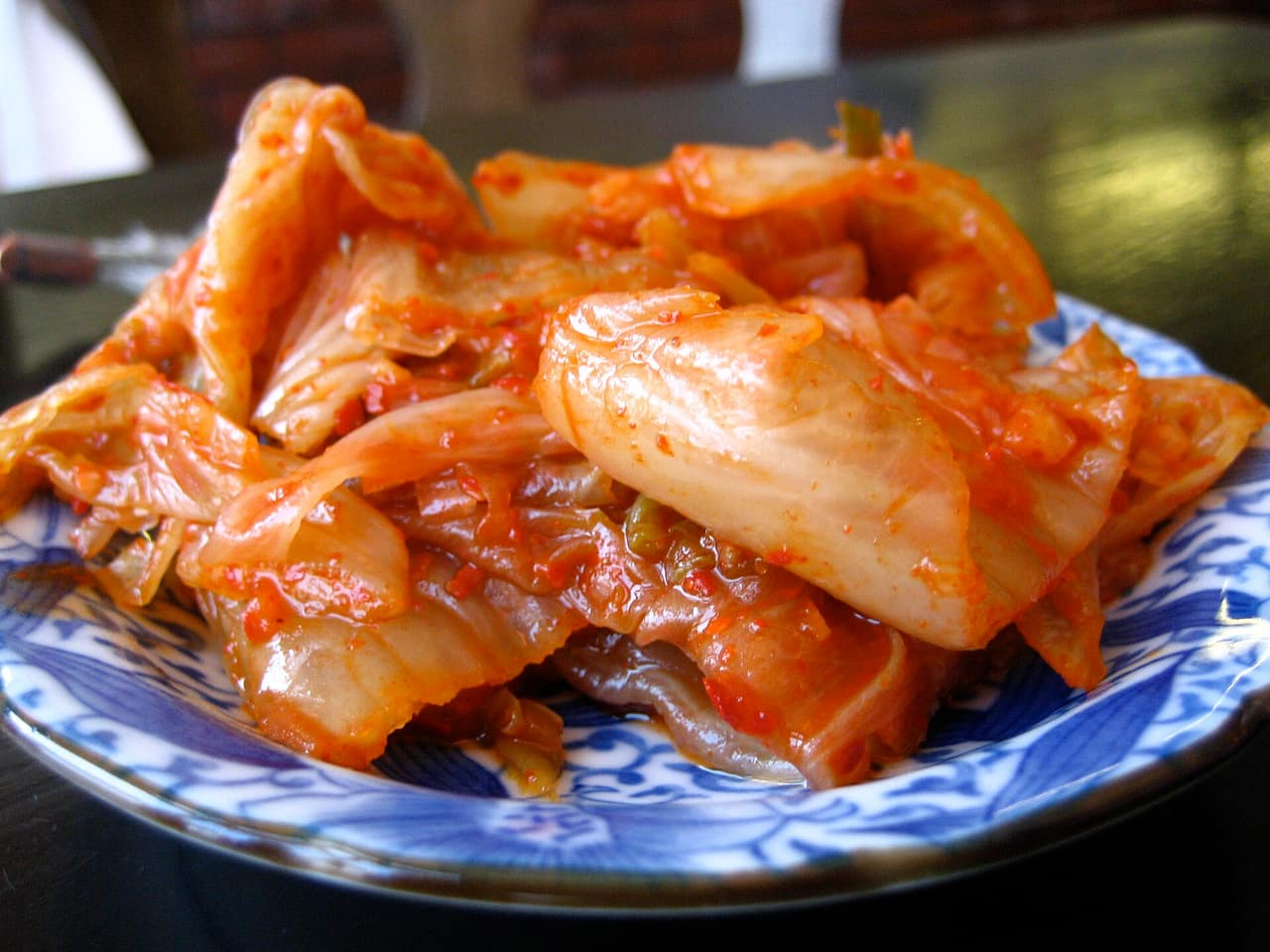 Red-seasoned napa cabbage kimchi in a bowl