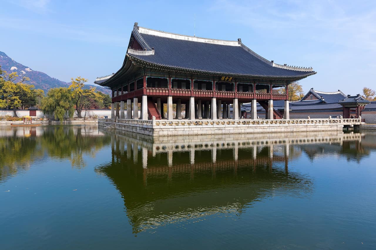 Gyeonghoeru pavilion standing on stone pillars above a pond at Gyeongbokgung Palace