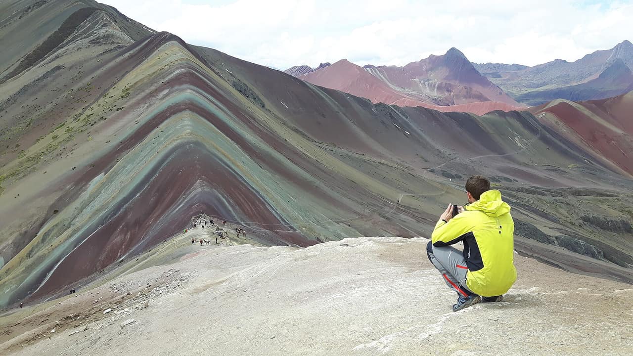 The striped mineral slopes of Vinicunca, Rainbow Mountain, in the Peruvian Andes