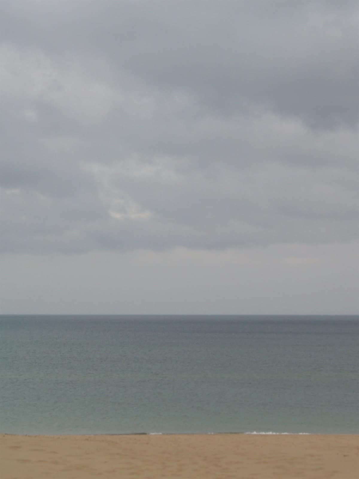 Sand, water and cloud at Warren Dunes State Park on Lake Michigan